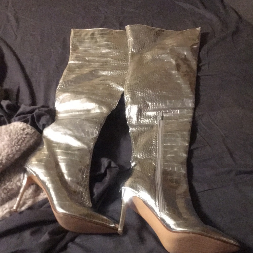 Thigh high silver boots